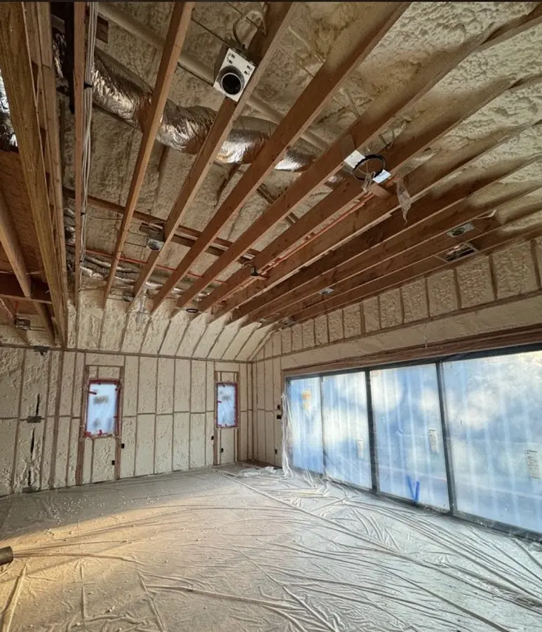 Interior walls and ceiling insulated with spray foam during new construction in Argentine