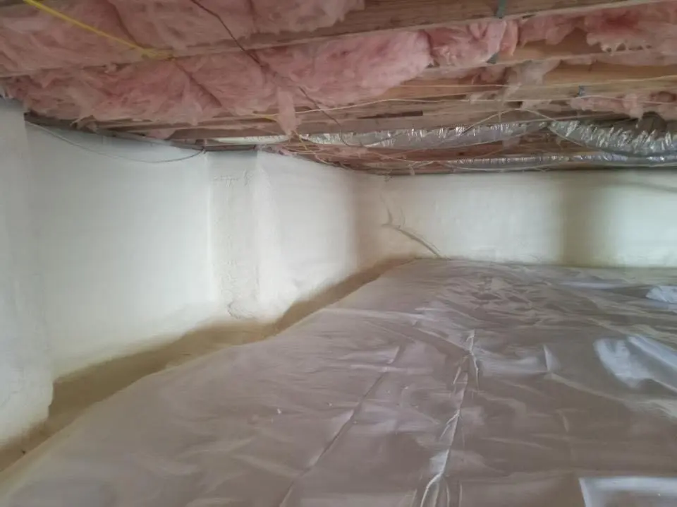Crawl space encapsulation with closed-cell spray foam for Commercial Roof Restoration in Argentine